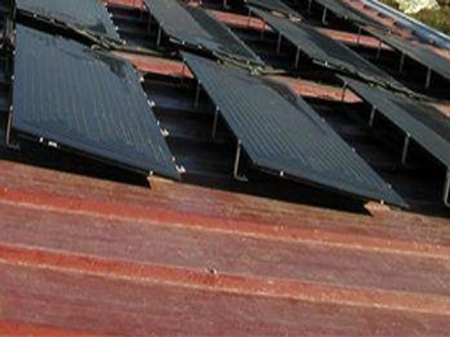 熱水工程墻面安裝聚熱板